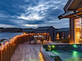 Luxurious cottage outside Bergen with Jacuzzi，位于Forland的酒店