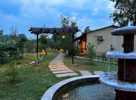 Grand Narmada Jungle Homestay Resort-Bandhavgarh，位于塔拉的酒店