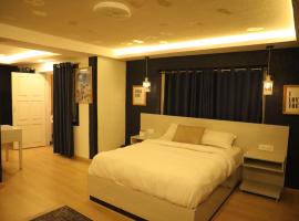 TAG hotel with garden，位于帕坦的酒店