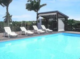 Maison de 3 chambres avec piscine partagee jardin clos et wifi a Sainte Anne a 3 km de la plage
