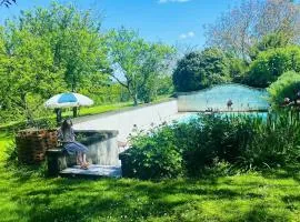 Gîte Romarin bain nordique jacuzzi l'ecrin de verdure