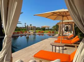 Pavillon du Golf -Palmeraie suites，位于马拉喀什马拉喀什棕榈林高尔夫球场附近的酒店
