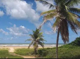 Quase pé na areia 60m da praia