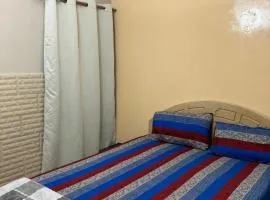 Fully Furnished bedroom with shared bathroom in a villa sharjah