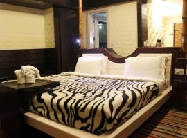 OYO Premium Corbett Marchula，位于加尔加的酒店