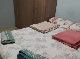 Quarto privativo em apartamento compartilhado