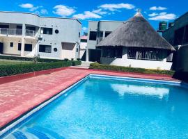 Kasbek Lodge and Tours Lusaka，位于卢萨卡肯尼思·卡翁达国际机场 - LUN附近的酒店