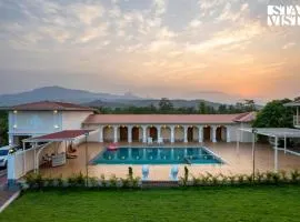 StayVista at Rio Vista with Pool, Lawn, Music Speaker & Game