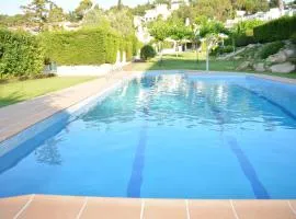 Casa adosada con jardin y piscina Tossa de Mar