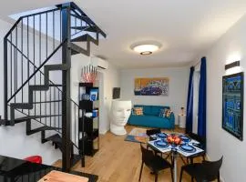 Attico Centro con terrazza e jacuzzi e parcheggio privati