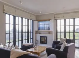 Reetland am Meer - LuxusPlus Reetdachvilla mit 4 Schlafzimmern und Kamin G11