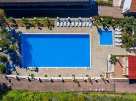 蓝色海滩酒店，位于新布萨纳的公寓式酒店
