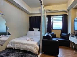 Nesting Lounge One at Santorini Condotel，位于马尼拉的酒店