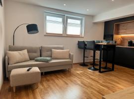1,5-Zimmer, Top ausgestattet, 4 Pers, Souterrain, Self Check-in, Parkplatz, Netflix & Amazon Prime，位于Flintsbach am Inn的酒店