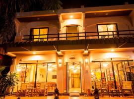 空芒日落之家酒店，位于功孟海滩的住宿加早餐旅馆