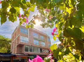 Hotel santa fe plaza sucursal HBP，位于圣菲德安蒂奥基亚的酒店