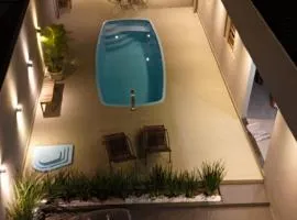 casa inteira com 3 suites e área de lazer