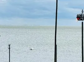 Apartamentai ant marių kranto