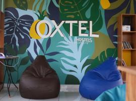 OXTEL GIRLS HOSTEL KOZHIKODE，位于科泽科德的酒店