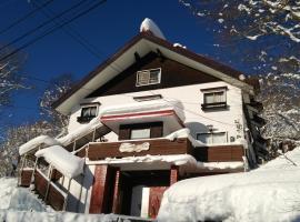 斑尾运动旅馆，位于饭山市的住宿加早餐旅馆