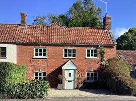 Tythe Barn Cottage，位于格拉斯顿伯里的酒店