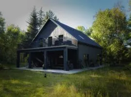 Brzozowa skarpa - dom nad jeziorem