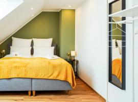 7Seas Boutique Aparthotel Homburg - stilvoll, digital, ideal f&uuml;r Familien- & Businessg&auml;ste，位于洪堡的带停车场的酒店