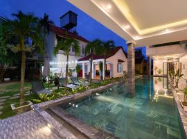 Hoi An Legend Charm Boutique Hotel，位于会安Cam Nam的酒店