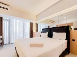 Fancy and Nice Studio Apartment Carstensz Residence By Travelio