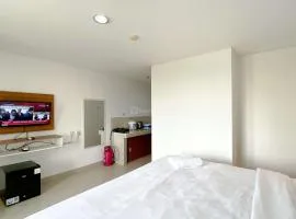 Comfy Studio with Twin Bed at Enviro Apartment By Travelio