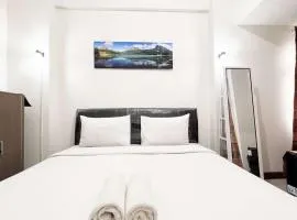 Compact Studio Room Apartment Vida View Makassar By Travelio