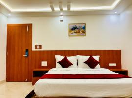 Hotel Starfinch Inn，位于库斯哈尔纳加尔的酒店