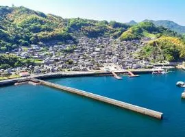海を眺めながらのんびり時間を過ごす家