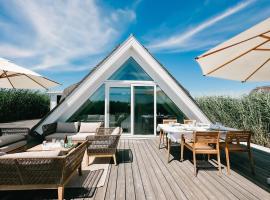 Seehütte Sonnenschilf - Premium Hide-Away Ferienhaus in Rust direkt am Neusiedlersee，位于拉斯特的酒店