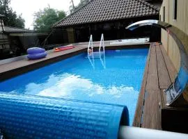 A comfortable holiday home with a swimming pool and jacuzzi in Miedzywodzie