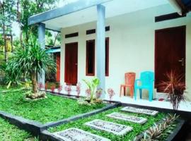Tangkoko Macaca，位于Rinondoran的酒店