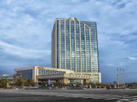 Eurasia Convention International Hotel，位于武汉武汉天河国际机场 - WUH附近的酒店