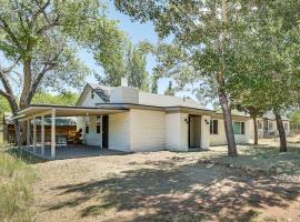 Serene Overgaard Home with Covered Patio and Swing Set，位于Overgaard的酒店