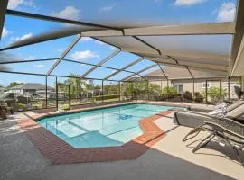 Surfside Beach House - Gorgeous Canal Front Home - Heated Pool & Boat Dock