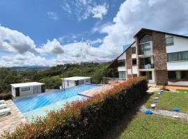 Finca Hotel Posada La Riviera，位于莫尼基拉的酒店