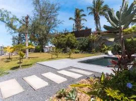 Ô 3 CAP - Magnifique Villa avec piscine CHAUFFEE - 8 personnes - accès direct à la plage et à l'esplanade de BOUCAN CANOT