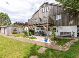 Föhrzeit 2 Klein und fein mit Terrasse, friesisch gemütlich，位于博尔格苏姆的酒店