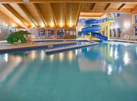 慕尼辛阿美瑞辛酒店及套房，位于Wetmore的带停车场的酒店