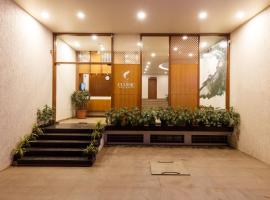Hotel Classic Mid Town, Kolhapur NEAR MAHALAXMI TEMPLE，位于戈尔哈布尔的酒店