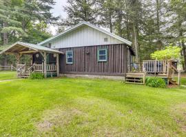 Peaceful Long Lake Cabin with Dock and Fire Pit!，位于Three Lakes的酒店