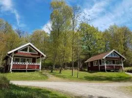 Holzhaus mit überdachter Terrasse