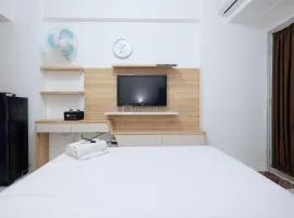 Modern and Homey Studio at Gunung Putri Apartment By Travelio