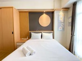 Best Homey 1BR at 52th Floor Vasanta Innopark Apartment By Travelio