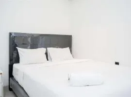 Enjoy Living 2BR Apartment at Carstensz Residence By Travelio