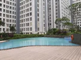 Good Deal and Cozy 2BR Apartment M-Town Residence near Mall By Travelio